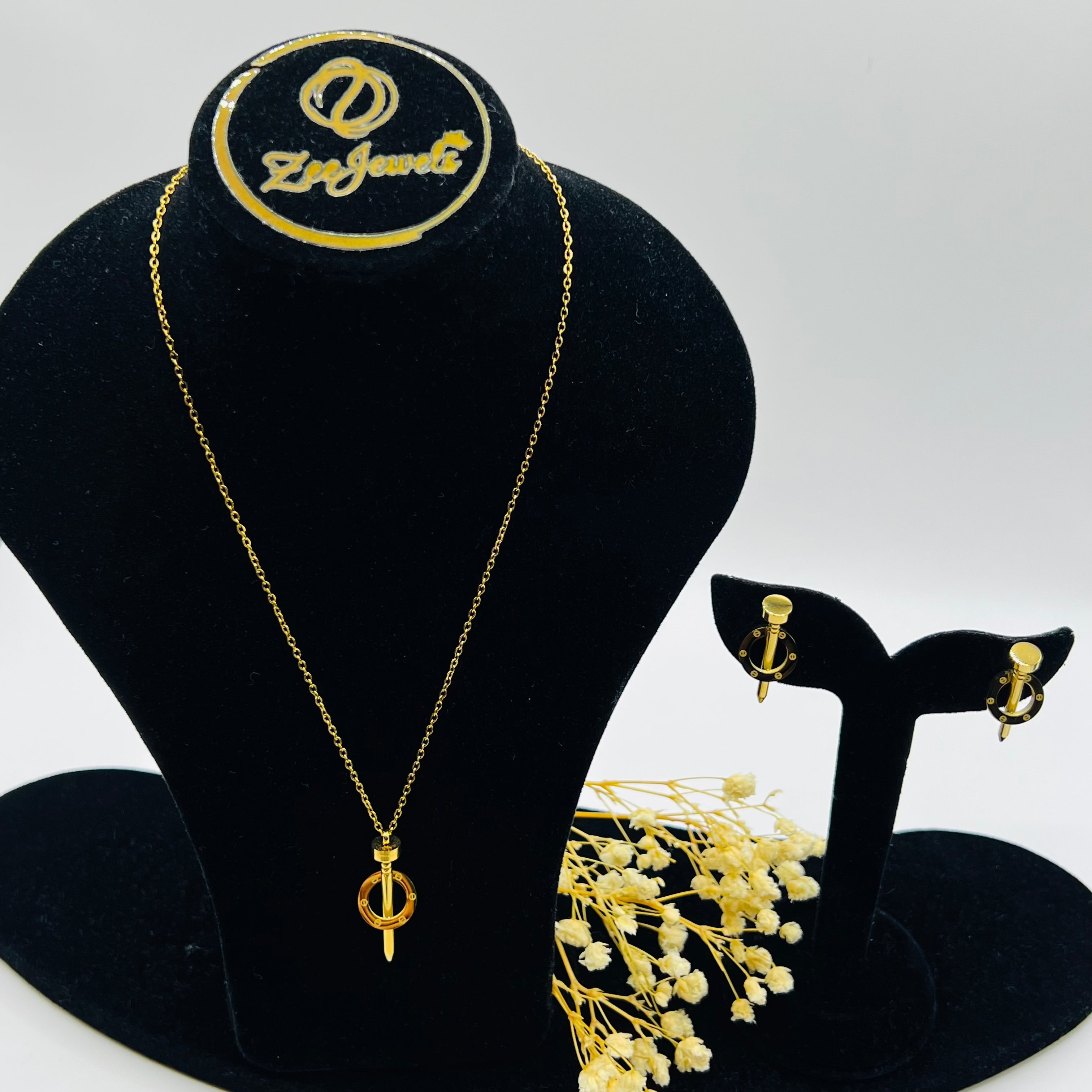 Nail necklace and earrings set